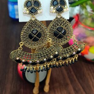 Black drop earrings with a floral design, adorned with sparkling rhinestones and golden accents