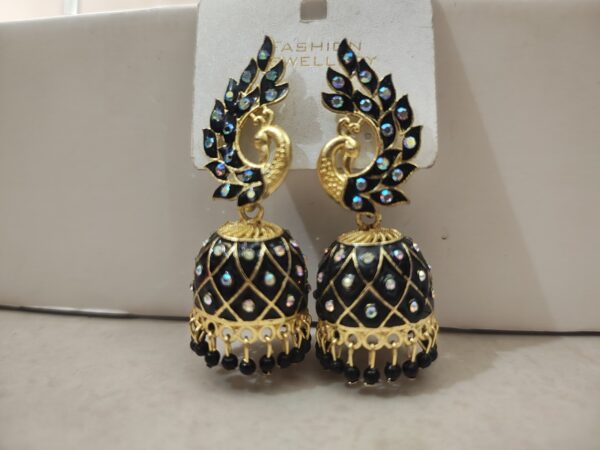 Black peacock jhumka earrings with dazzling rhinestones.