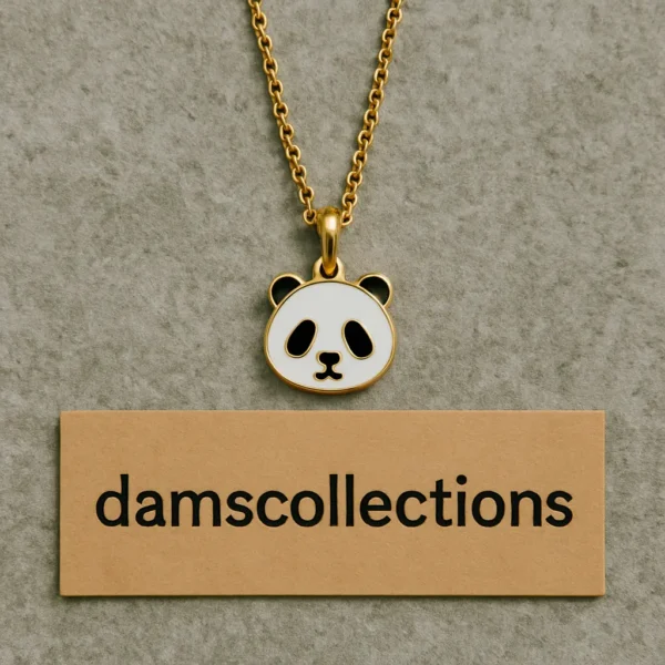 Cute gold panda pendant necklace placed on Dams Collections tag