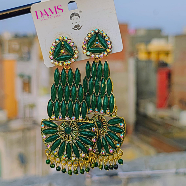 Royal green chandelier earrings with gold detailing and shimmering stones, perfect for weddings and festive occasions.