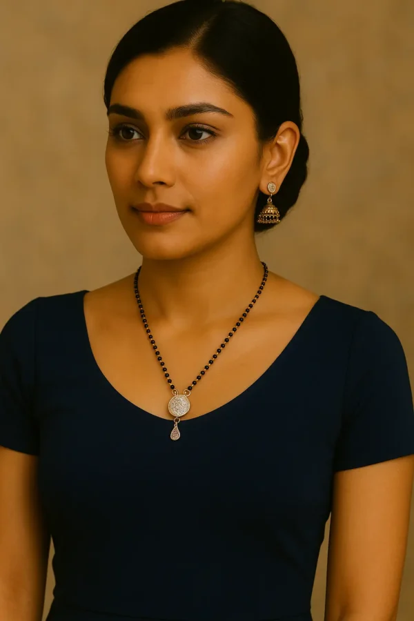 Woman wearing a western dress and black top with an artificial diamond mangalsutra and ethnic jhumka earrings, showcasing an elegant and timeless Indian look.